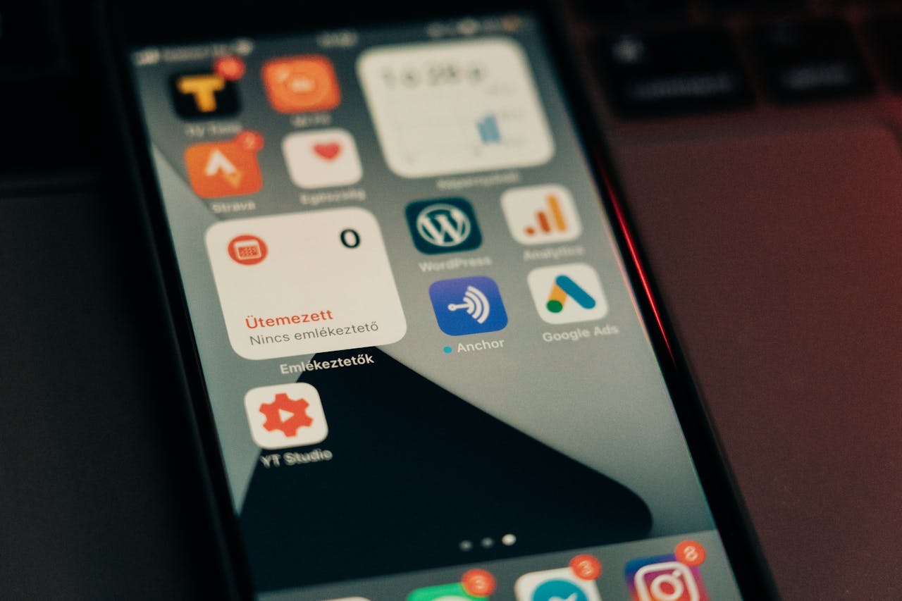 Mastering the First Impression: Your intriguing post title goes here Close-up view of smartphone screen featuring various app icons and notifications.